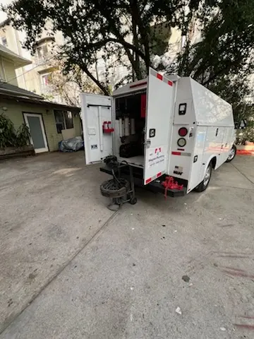 Magnet Plumbing service vehicle on-site for Grease Trap Cleaning in Pacific